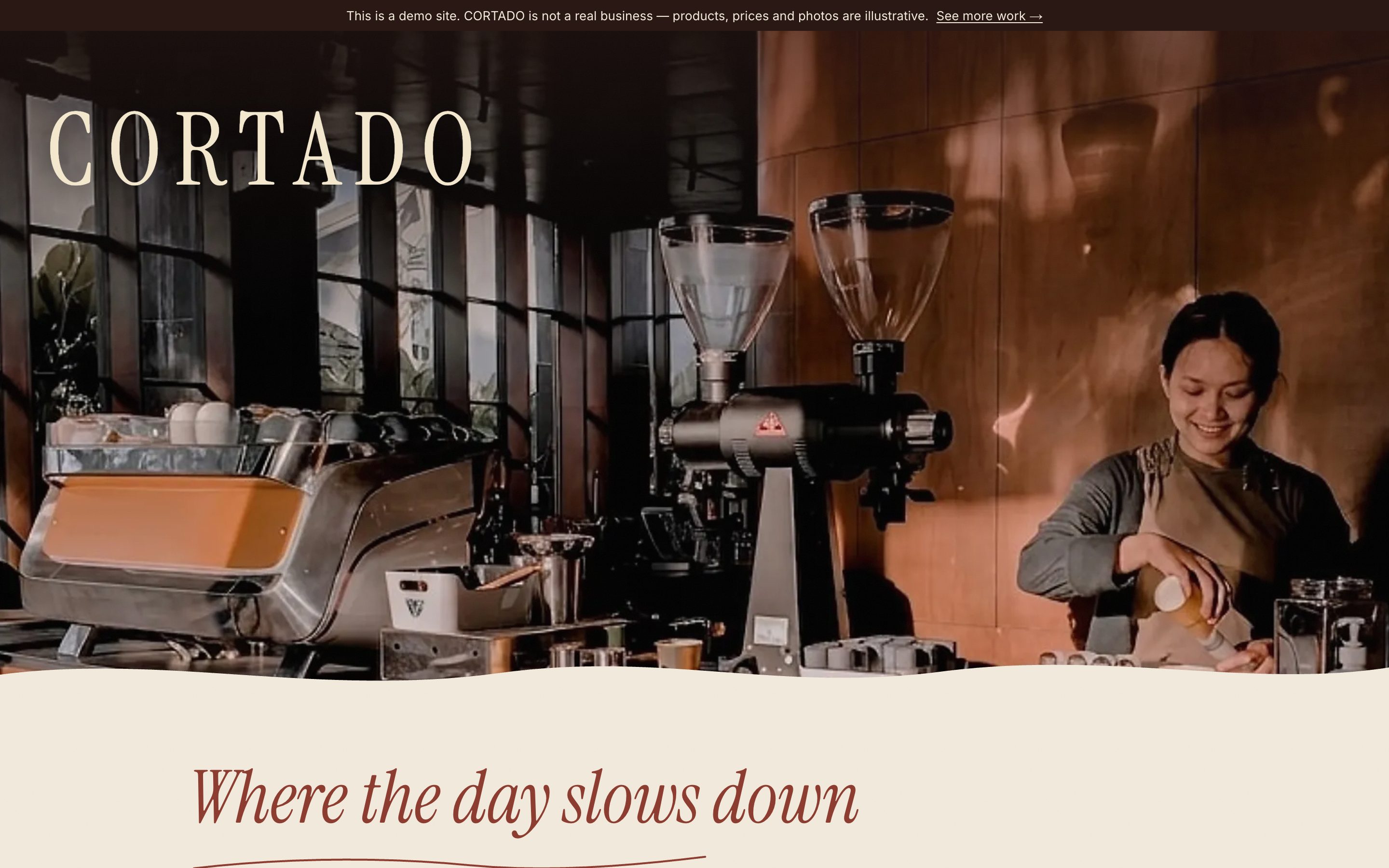 CORTADO's front page: the barista behind the counter, the wordmark over it, and the first cards below.